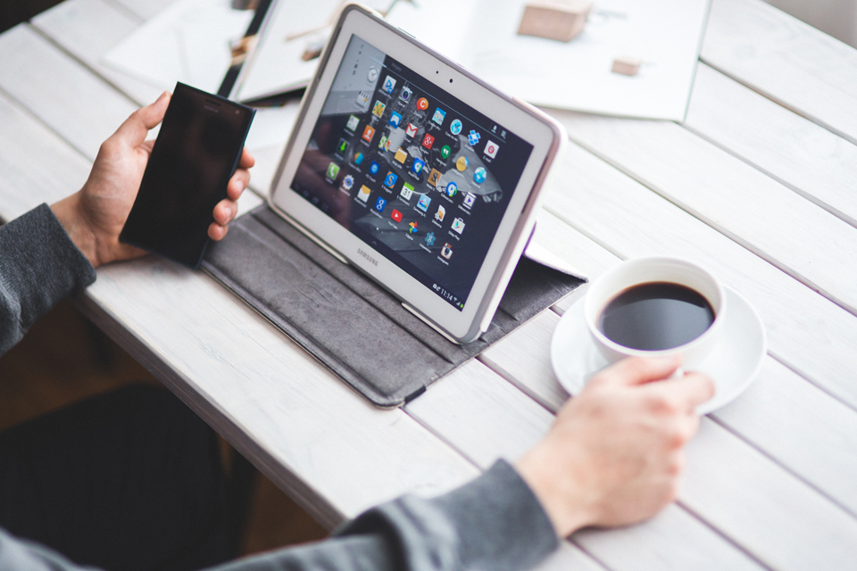 Man with coffee and internet